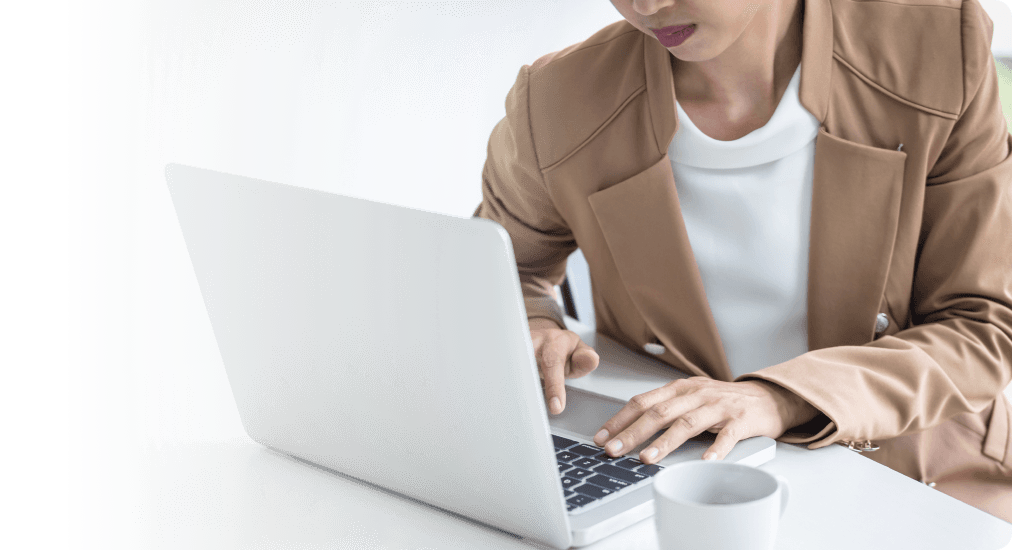 woman typing on laptop