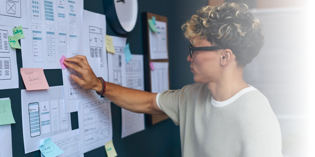 Engineer gathering ideas for custom app features