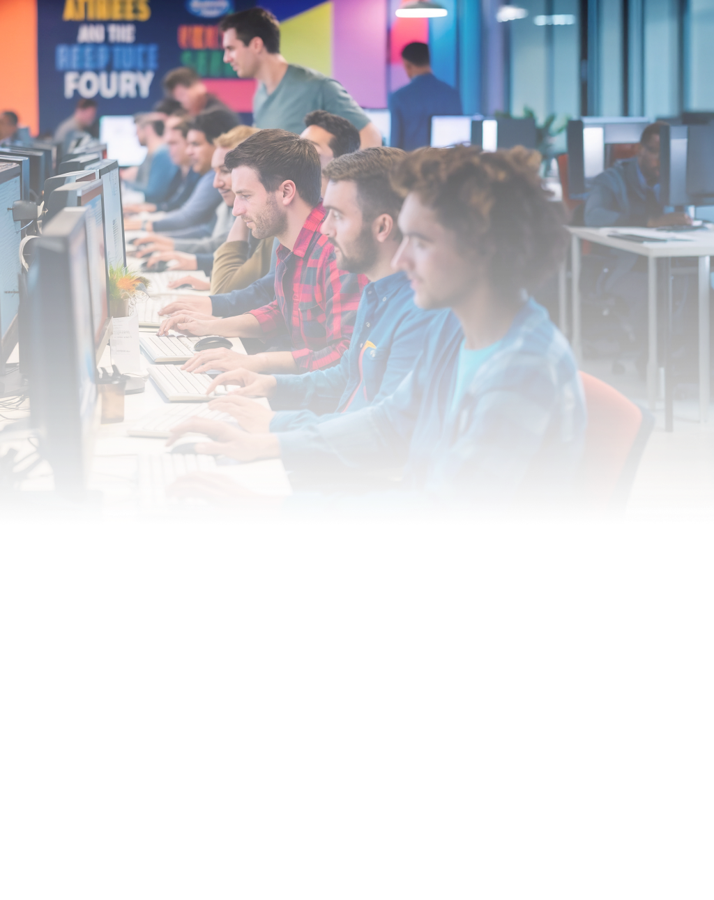 a group of engineers working in the office