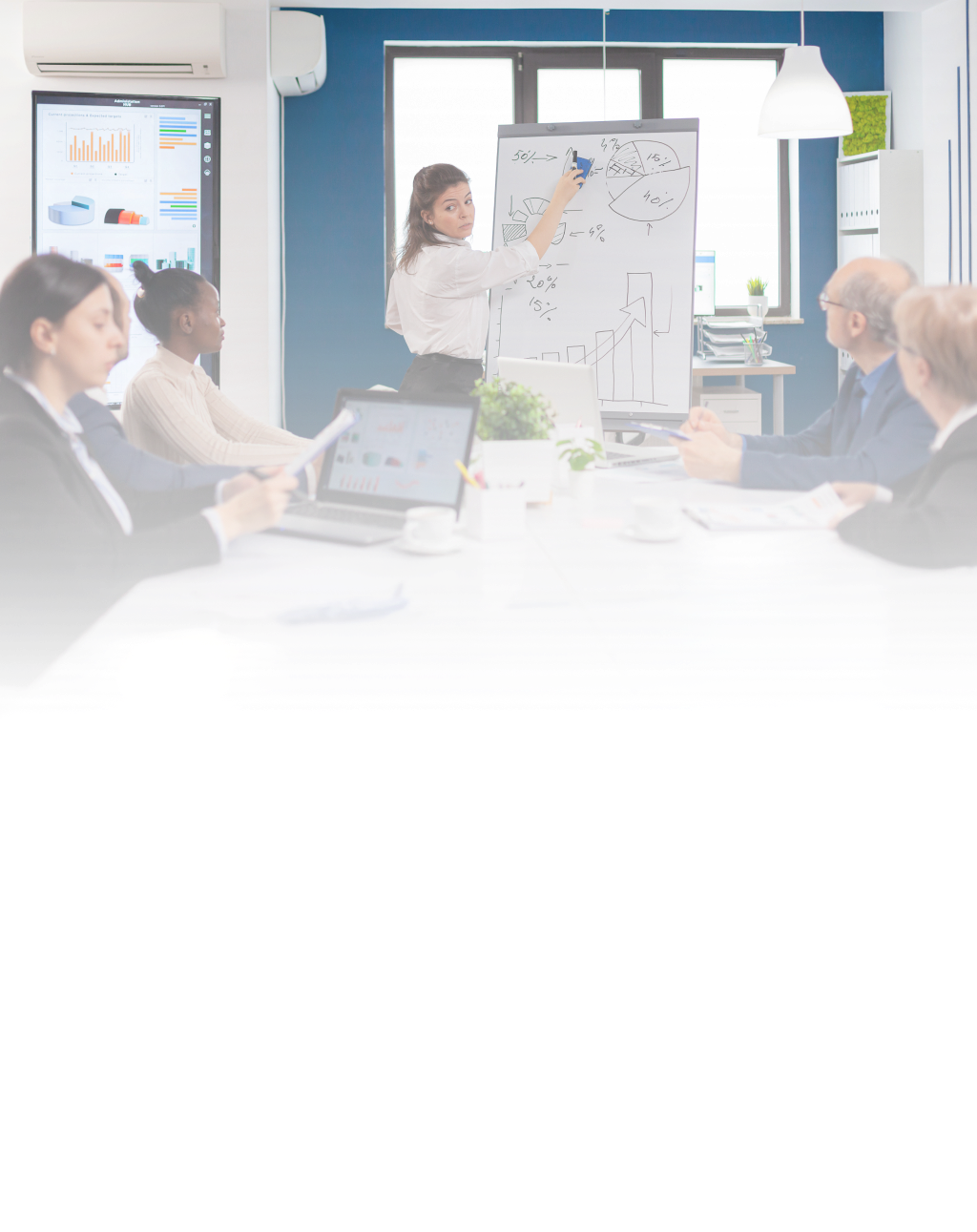 custom insurance software - a team discussing it at the meeting