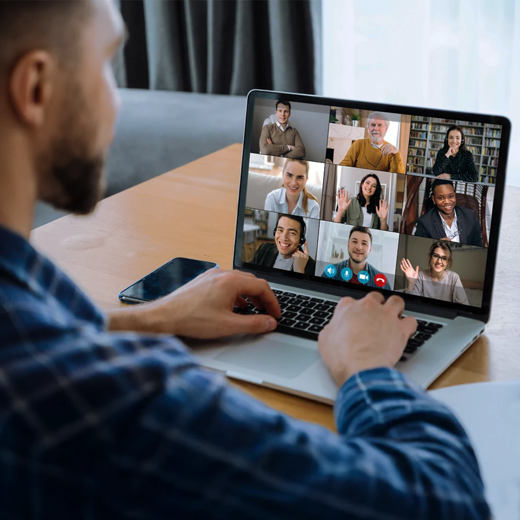 Developer attending virtual team meeting