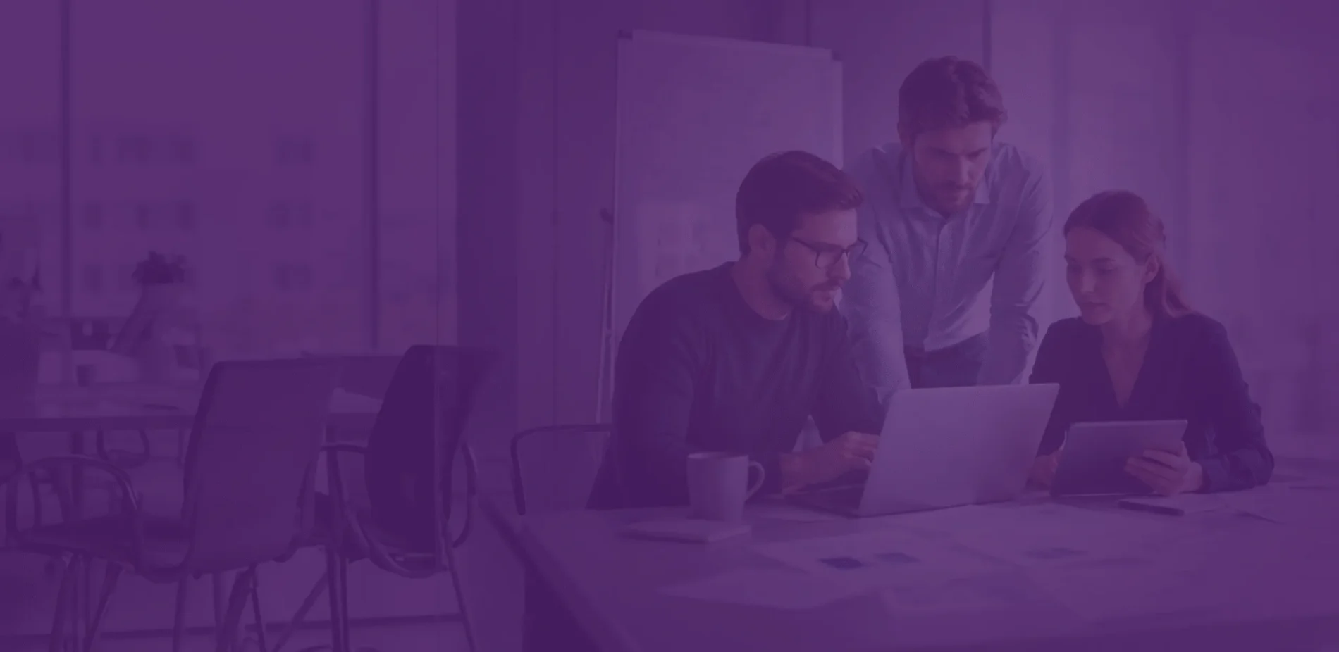 IT team collaborating during a technical due diligence assessment