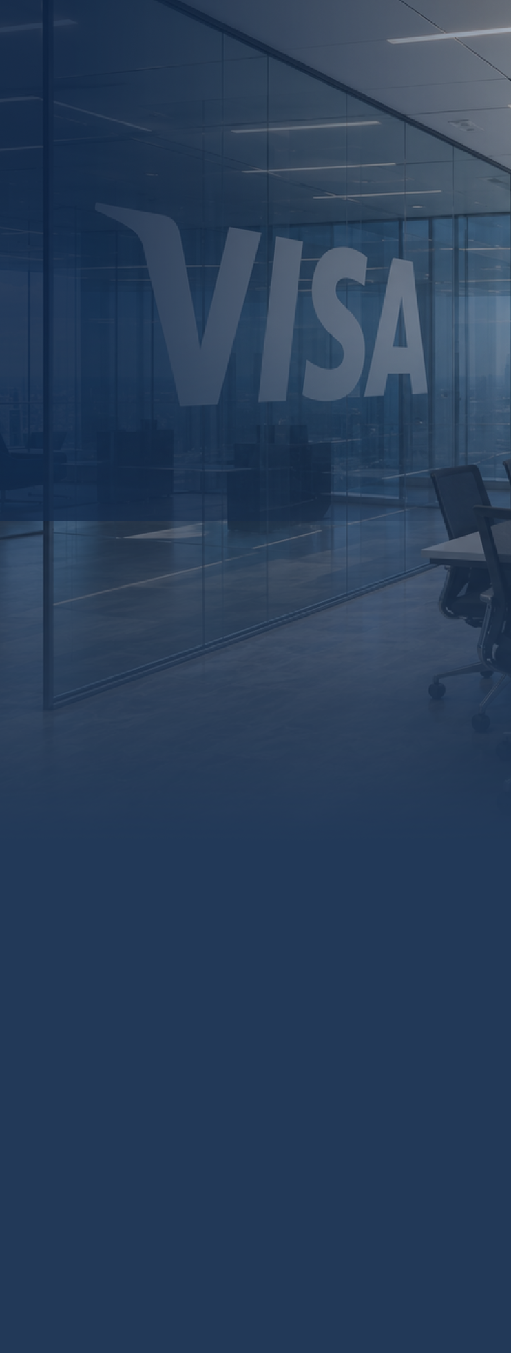 Modern conference room featuring a large Visa logo on glass.
