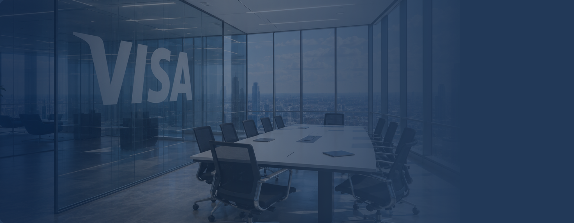 A modern conference room with a large Visa logo on the glass